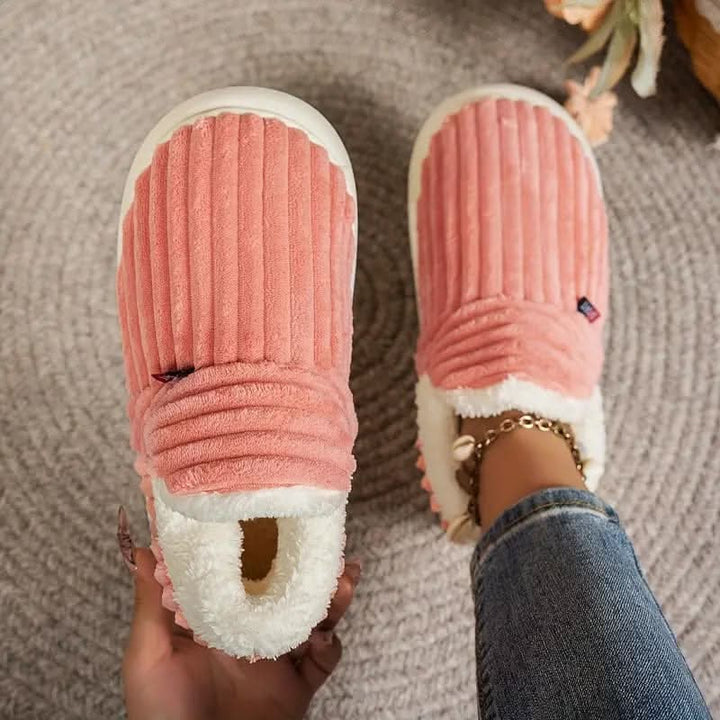 Soft grey thermal unisex house slippers, cushioned for comfort, with a durable non-slip sole.