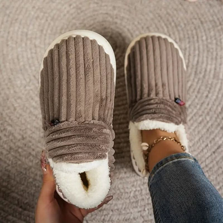 Unisex thermal warm slippers, non-slip, cushioned design for cozy and safe indoor lounging.