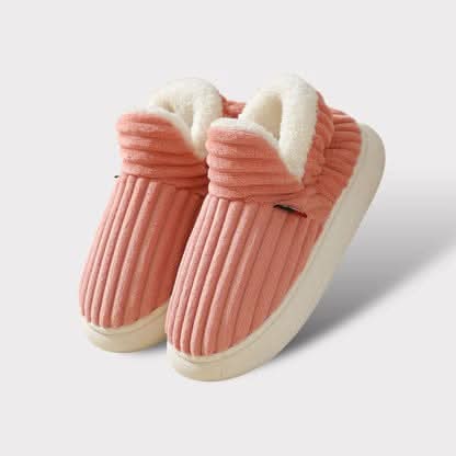 Classic design thermal slippers, unisex, providing cozy warmth and cushioned support indoors.