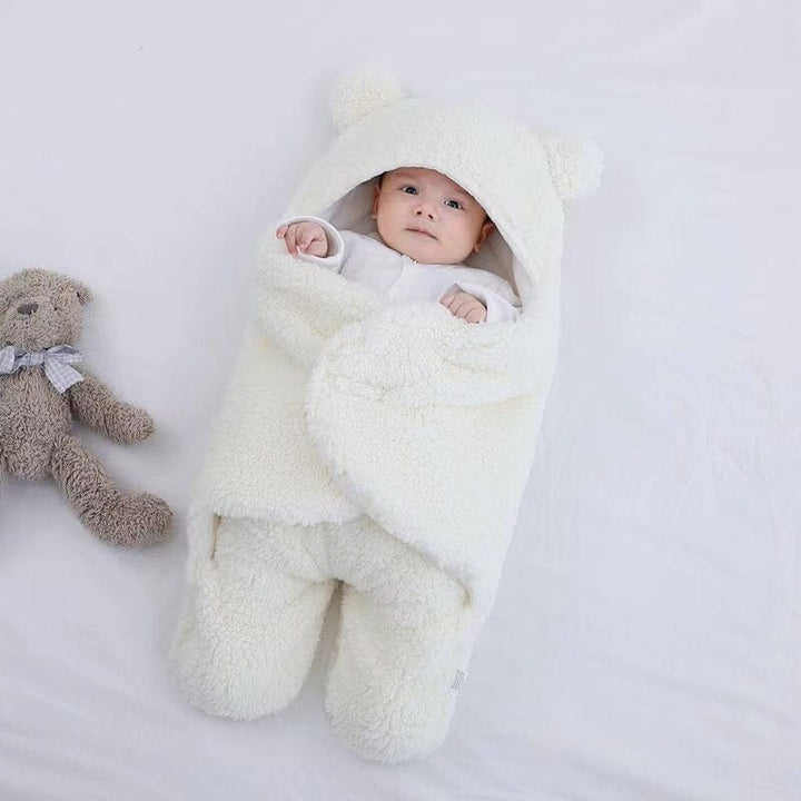 Quilted baby swaddle/sleepsack, ultra soft for newborns. Cozy winter infant wrap with charming bear ears.