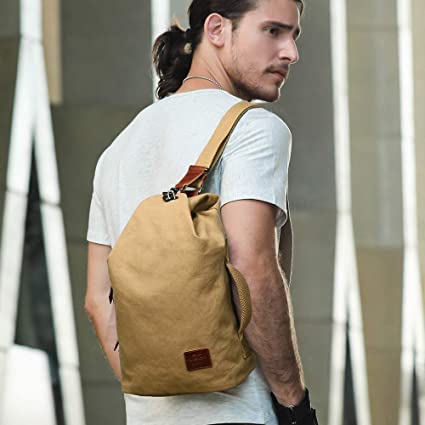 Unisex water-resistant canvas crossbody bag with anti-theft pocket, perfect for daily use & travel.