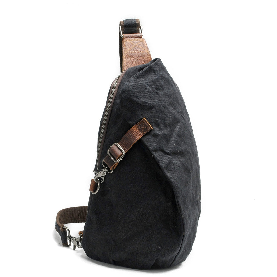 Unisex water-resistant canvas crossbody bag with anti-theft pocket for secure daily carry.