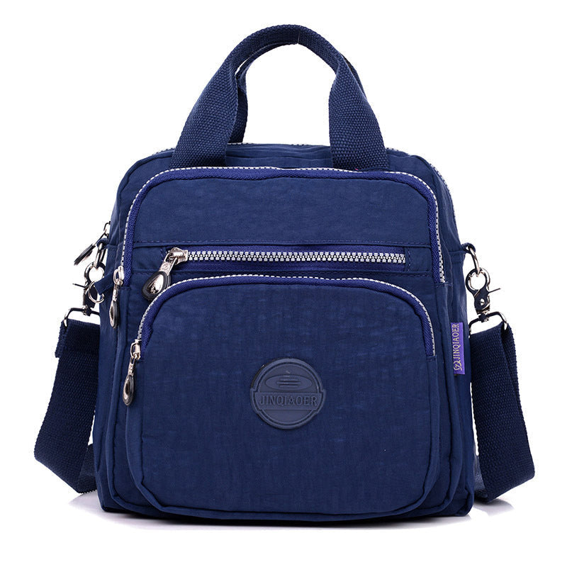 Model wearing the versatile crossbody bag, demonstrating how it can be worn various ways for travel or daily use.