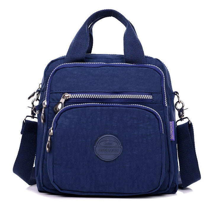 Model wearing the versatile crossbody bag, demonstrating how it can be worn various ways for travel or daily use.