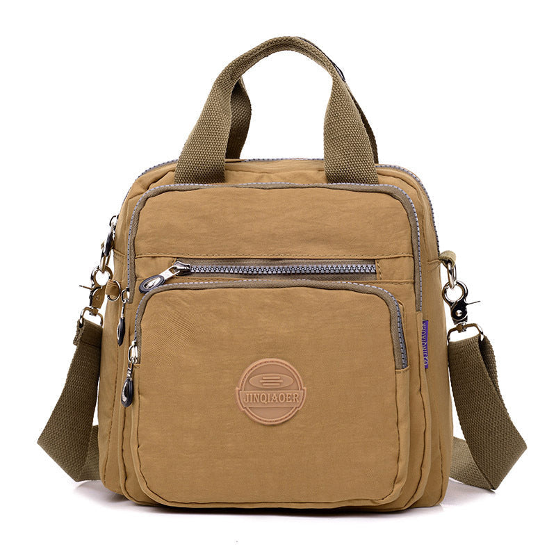 New arrival! Stylish unisex water-resistant messenger bag with multiple pockets, a must-have travel accessory.