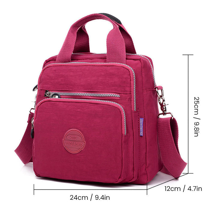 Side profile of the durable crossbody bag, illustrating its slim yet spacious design for daily use.