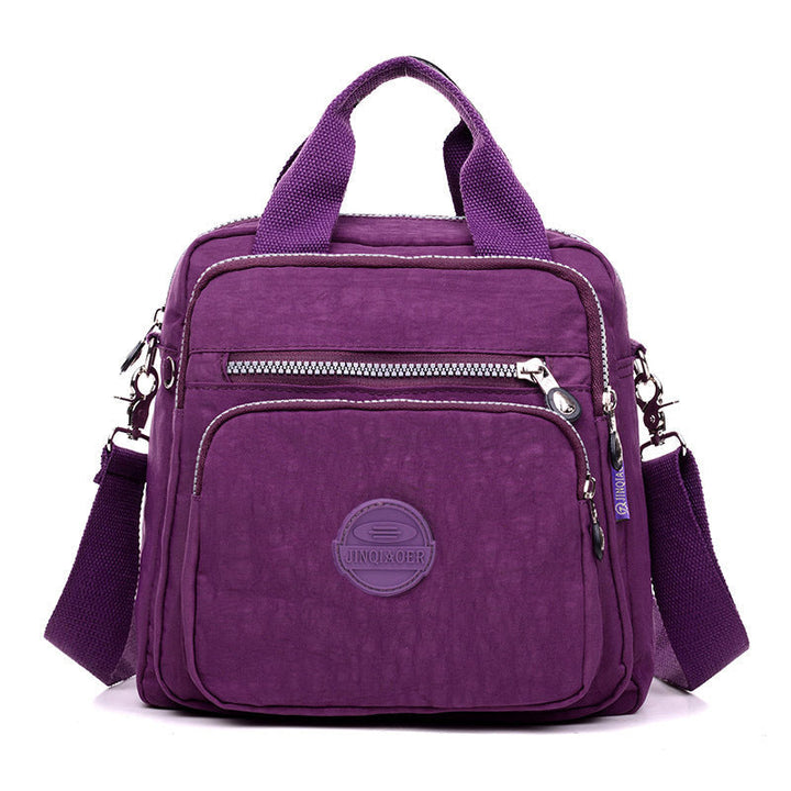 Inside view of the messenger bag, revealing organizational pockets and ample space for travel necessities.