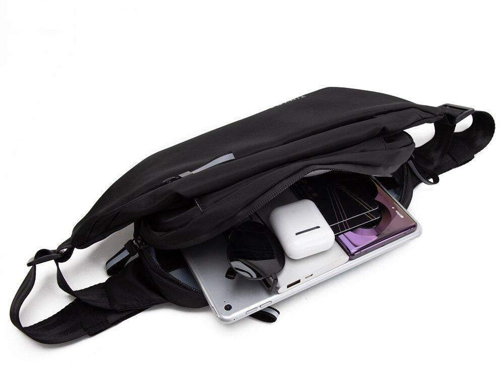Unisex water-resistant multi-pocket fanny pack, ideal for travel, hiking, & sport. Stay hands-free & organized.