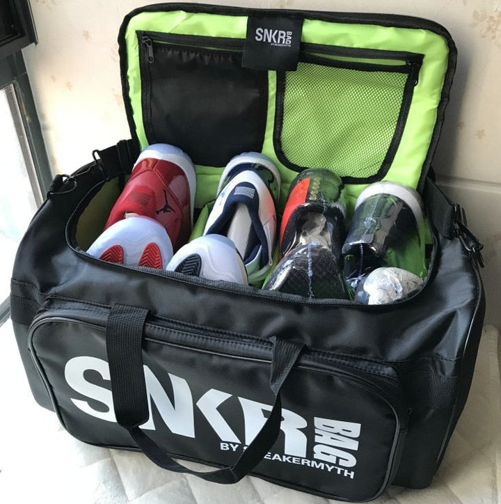 Black water-resistant sneaker storage bag. Ideal for travel, gym, and gear. Adjustable compartments.