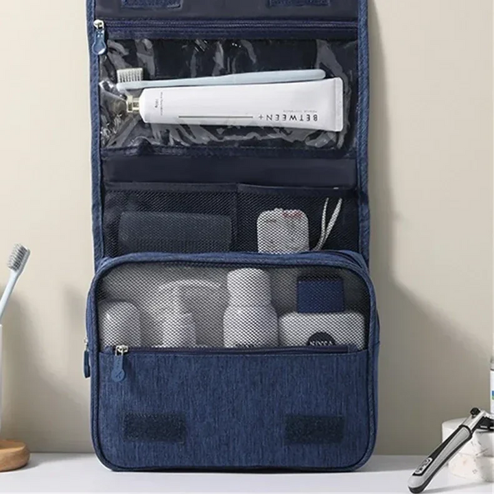 Compact bathroom caddy & grooming kit organizer, perfect for travel, shown with its integrated hanging hook