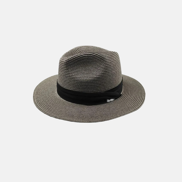 Stylish unisex wide brim straw hat, ideal as a summer fashion accessory for beach, travel, or casual outdoor wear.