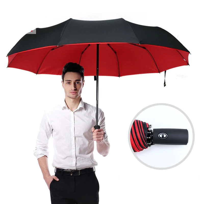 Unisex windproof storm umbrella for heavy-duty rain protection. Compact, automatic travel gear for all-weather.
