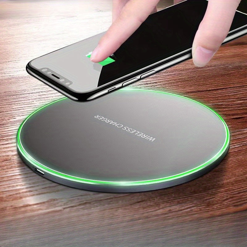 Universal fast wireless charging pad for smartphones, compatible with iPhone & Android devices.
