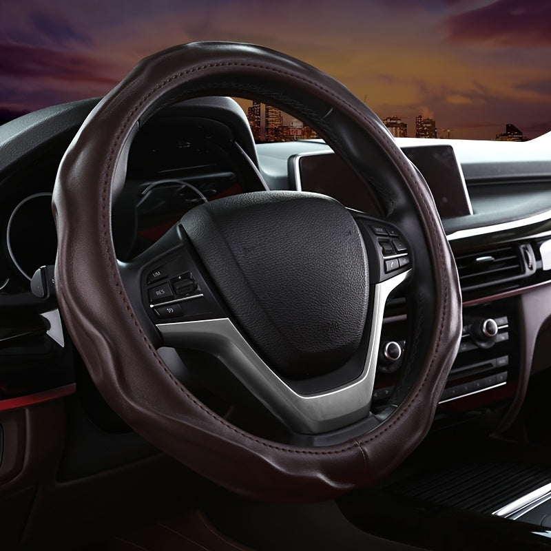 Enhance driving with this universal non-slip PU leather steering wheel cover for optimal comfort.
