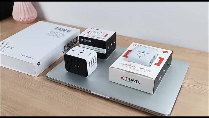 New universal travel adapter & global charger, in packaging, ready for worldwide fast charging.