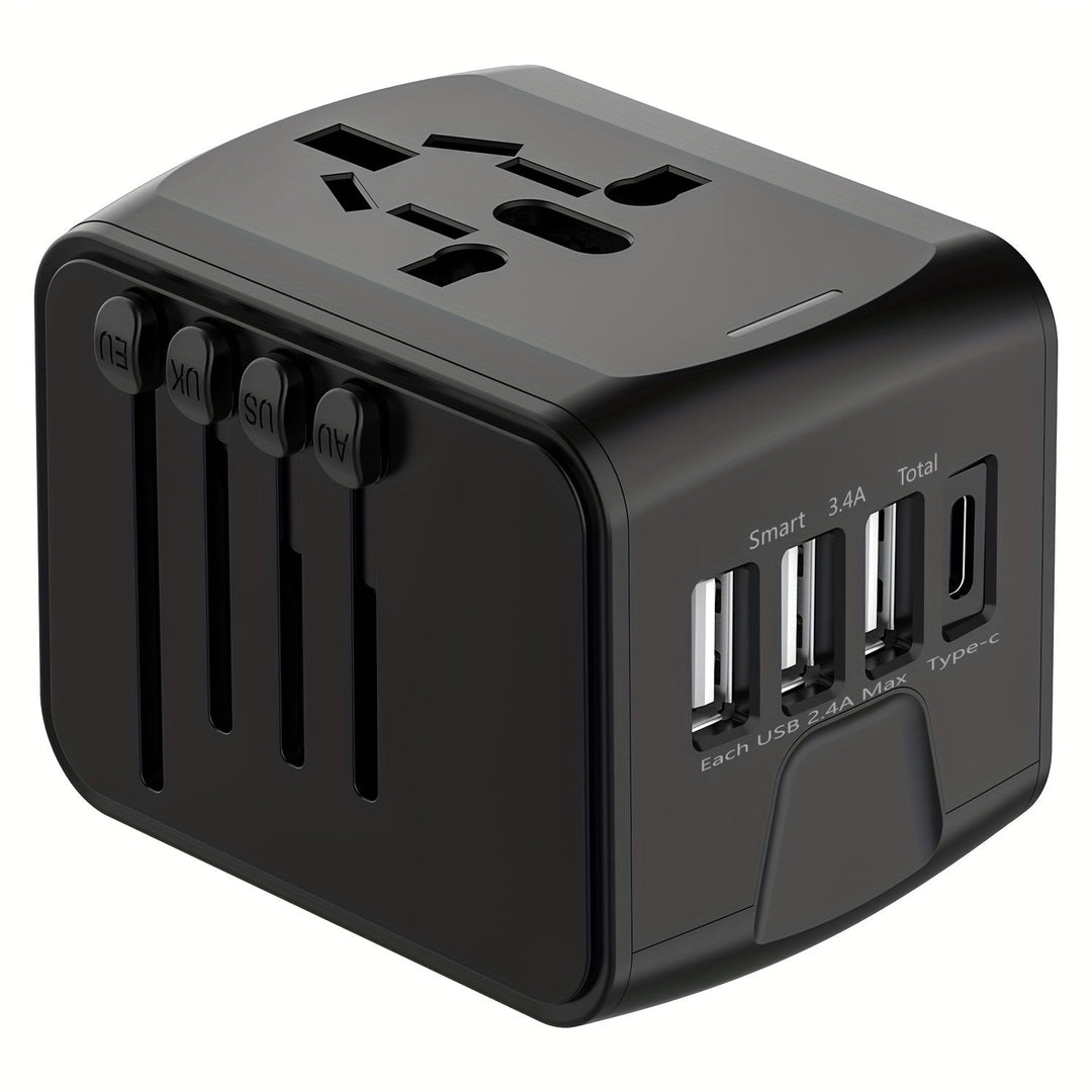 Hand holding a sleek black universal travel adapter; compact & ready for any global adventure.