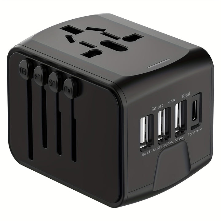 Hand holding a sleek black universal travel adapter; compact & ready for any global adventure.