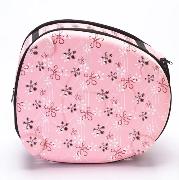 Gray cat carrier for safe travel, features ample ventilation & portable design.