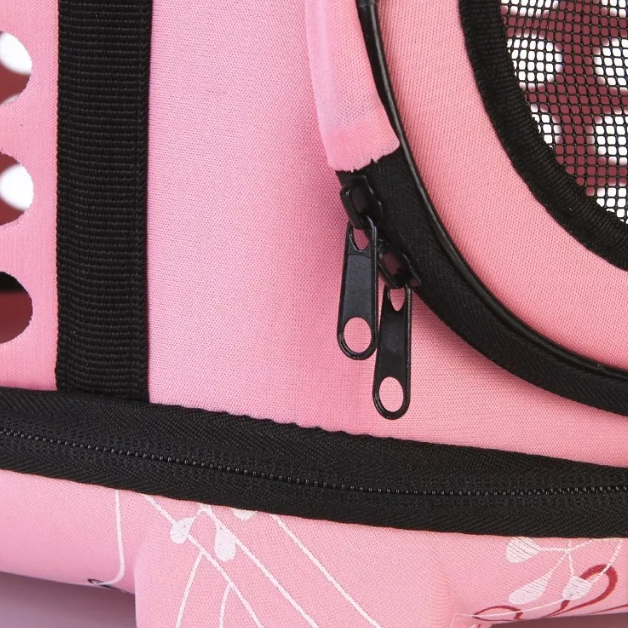 Stylish cat travel bag with strong handles and mesh windows for ultimate pet safety.