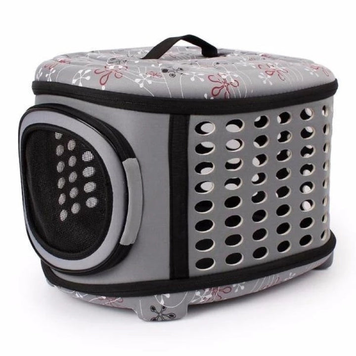 Safe cat carrier bag with mesh ventilation for secure pet travel & outdoor trips.