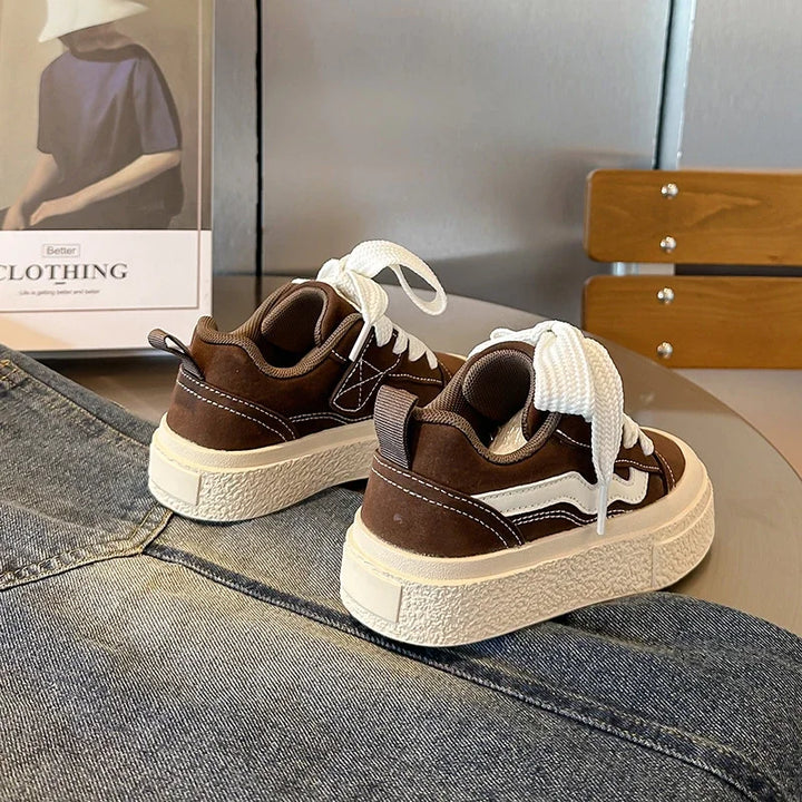 Durable junior sneakers designed for active play, offering superior comfort and stylish support for all-day wear.