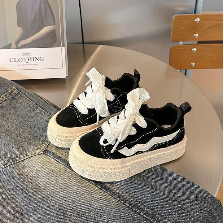 Boys' colorful active sneakers providing ultimate comfort, durability, and a secure fit for all their playful activities.