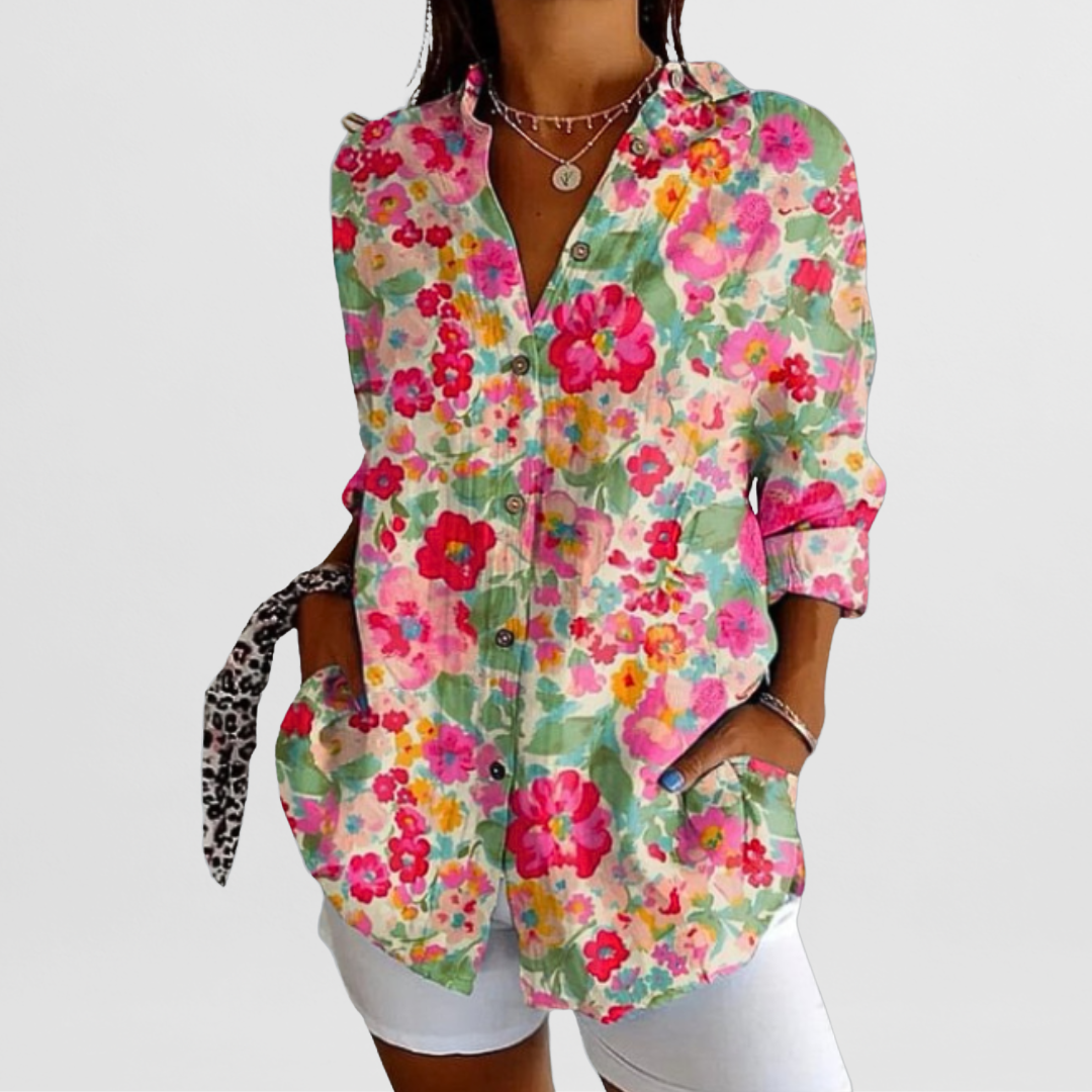 Ladies' vibrant tropical floral blouse, loose fit, button front. Great for casual spring & summer outfits.