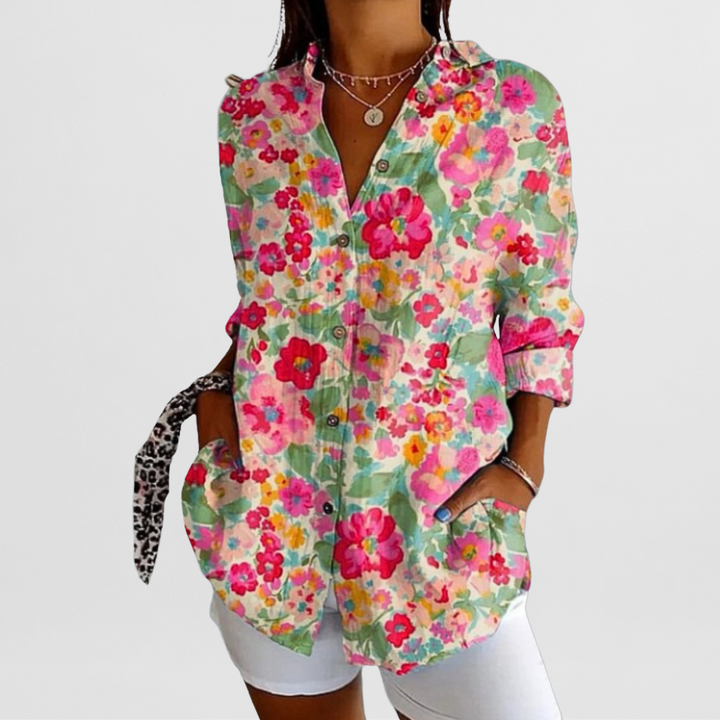 Ladies' vibrant tropical floral blouse, loose fit, button front. Great for casual spring & summer outfits.