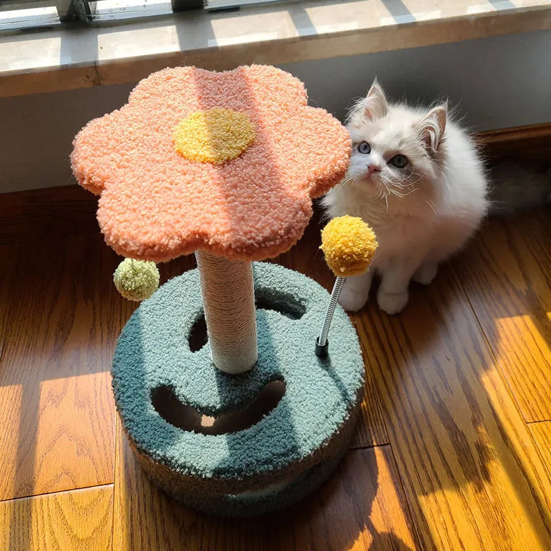 Vibrant sunflower scratching post for cats with an interactive toy and spacious play area, ideal pet furniture.