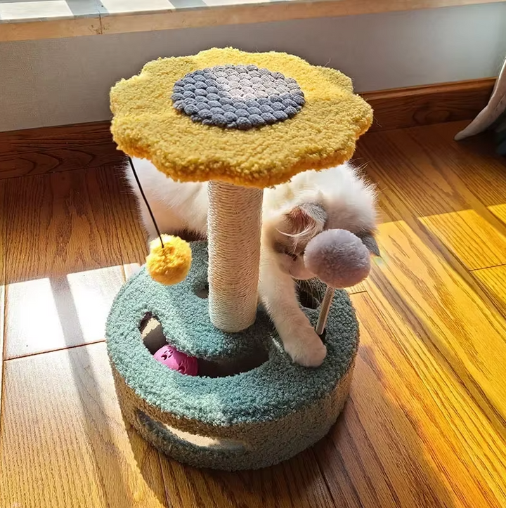 Durable sisal sunflower scratching post offering a vibrant design and an interactive toy for playful cats.