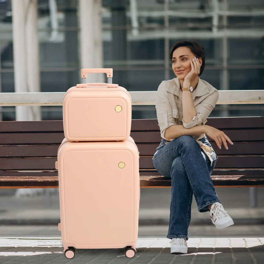 Compact wheeled travel suitcase set with carry-on and cosmetic bag, ideal for airport-ready trips.