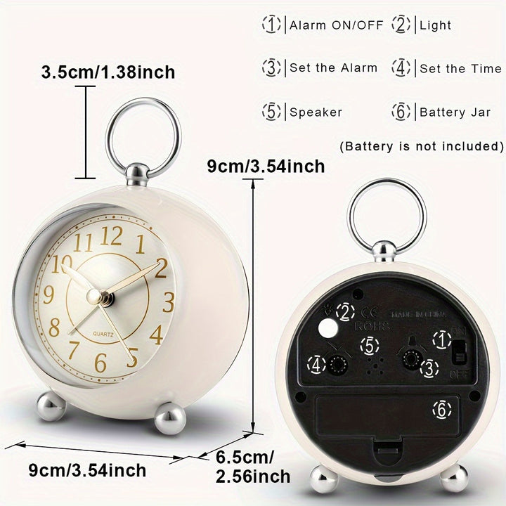Functional vintage analog alarm clock, quiet, with a glowing night light for readability.