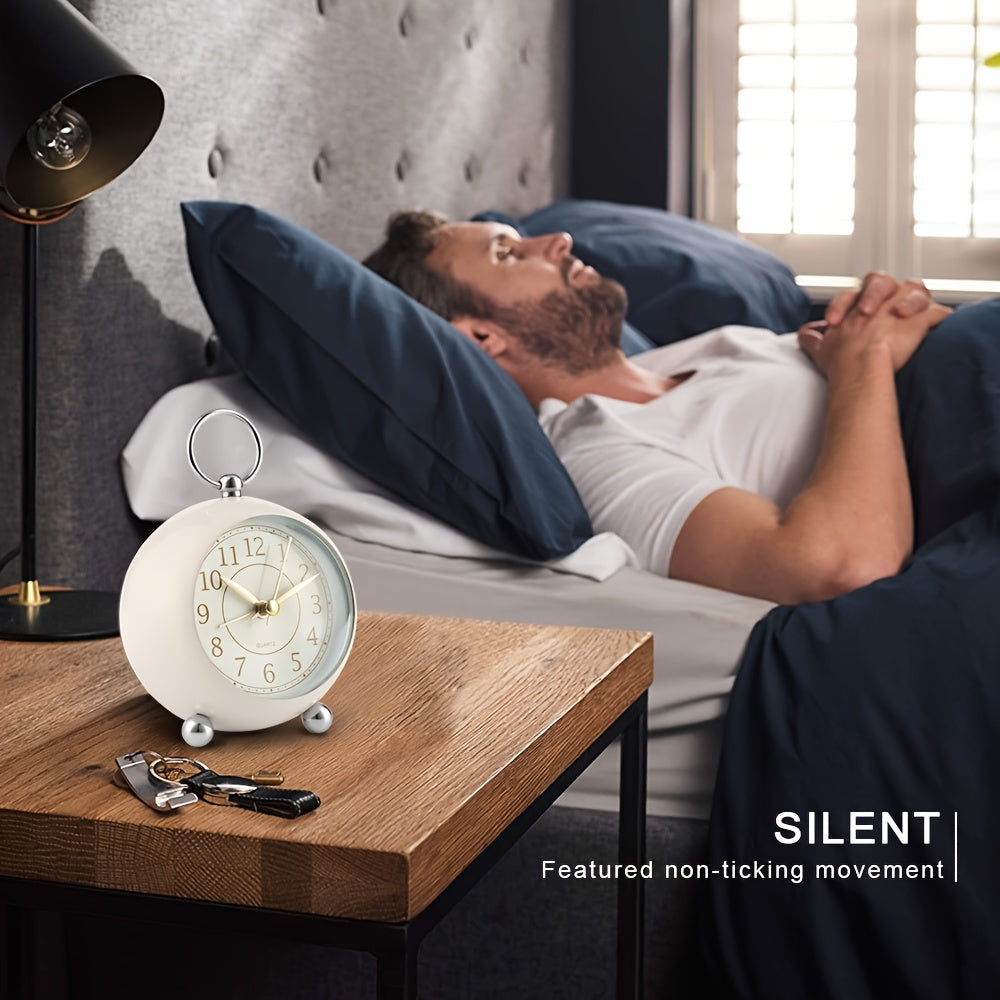 Retro style analog alarm clock, quiet, battery operated, great for any bedroom with night light.