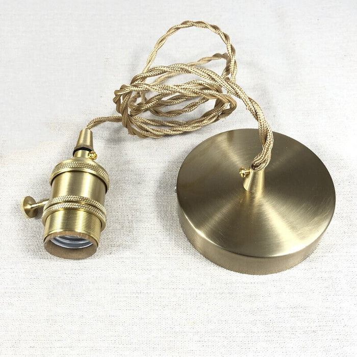 Vintage cylindrical glass pendant lamp casting warm glow; elegant centerpiece for home decor. Perfect for living and dining a