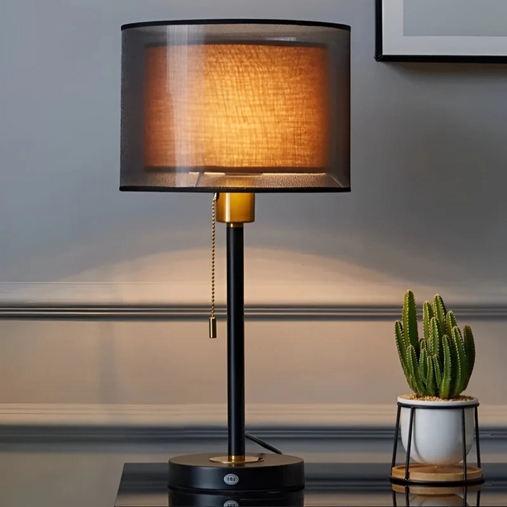 Vintage LED table lamp with double fabric shade, perfect for warm ambient light in bedroom.