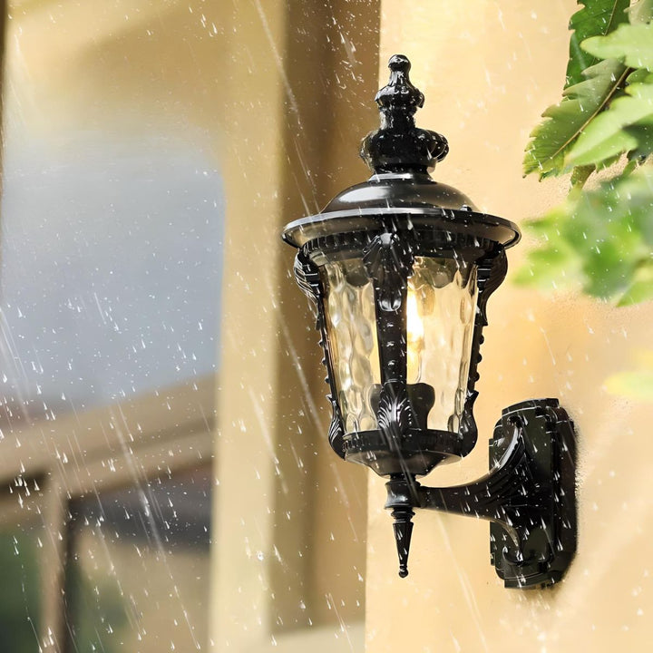 Ornate vintage outdoor wall light fixture, aluminum, ideal for classic home exteriors.
