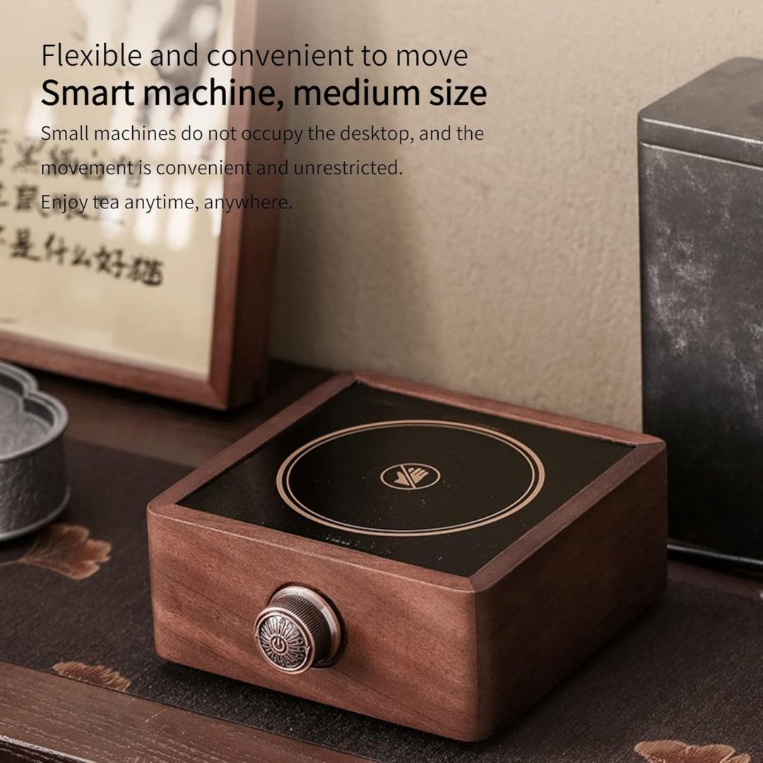 Hand adjusting temp on a beautiful walnut electric tea warmer, perfect for coffee, tea & hot beverages.