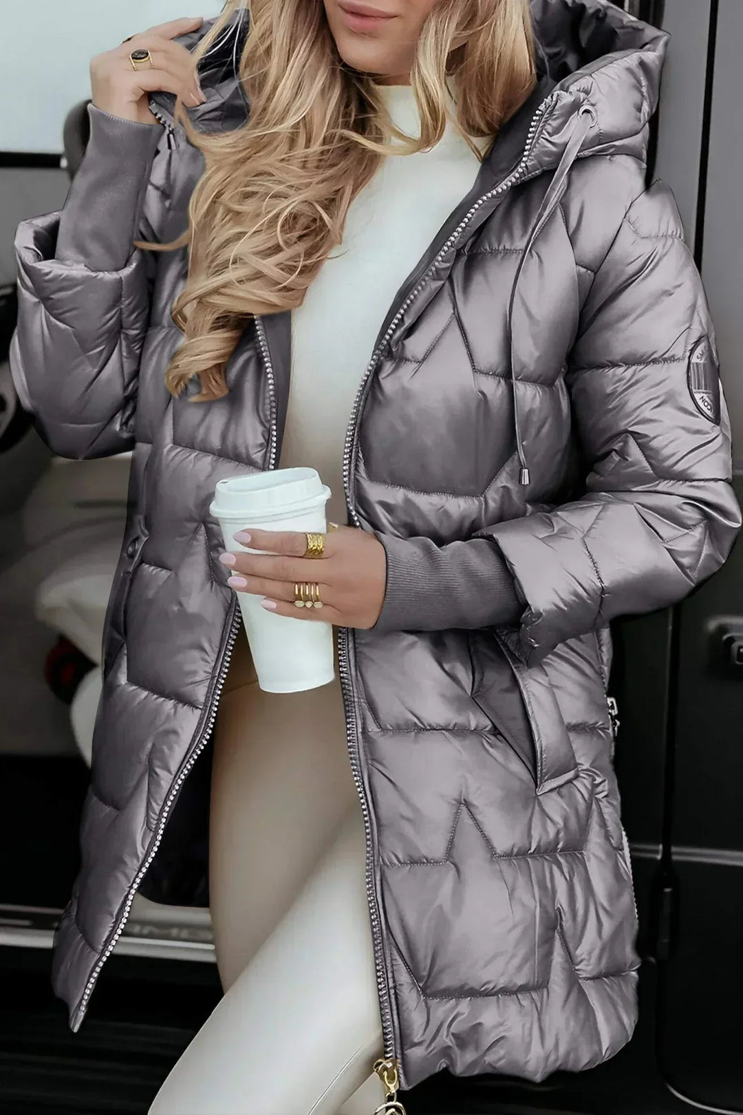 Elegant women's long padded hooded outerwear, a versatile winter jacket for daily wear