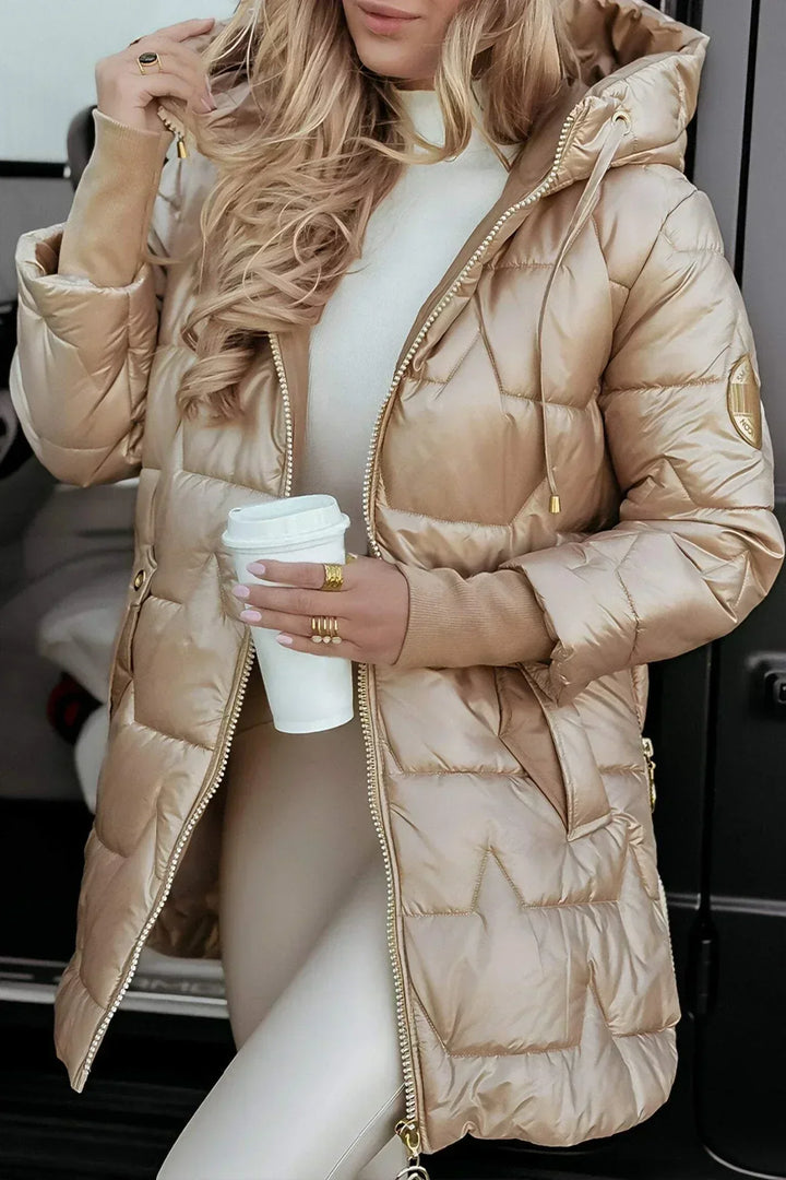 Casual women's long puffer jacket with hood, perfect for Canadian winters. Front view.