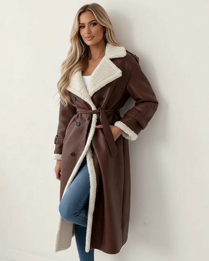 Elegant women's long winter coat with luxurious shearling lining, providing ultimate warmth and style