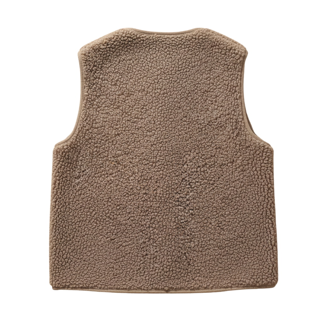Close-up of plush sherpa material on a women's warm casual vest, showcasing texture.