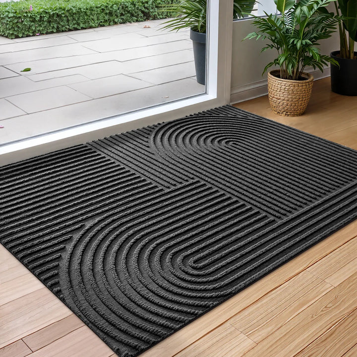 Water-absorbing, non-slip door mat for clean, dry home entrances. Quick-dry, dirt trap, resilient indoor/outdoor floor mat.