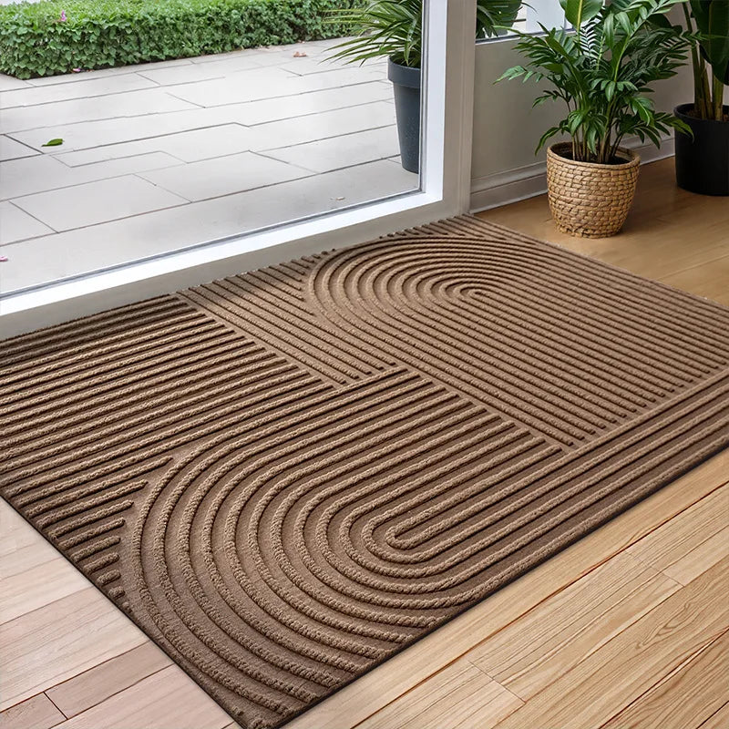 Efficient water-absorbing, non-slip door mat for home entryways. Quick-dry, dirt trap design ensures a clean, dry floor.
