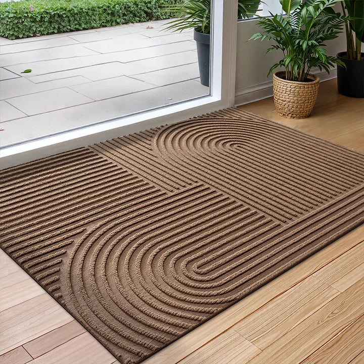 Efficient water-absorbing, non-slip door mat for home entryways. Quick-dry, dirt trap design ensures a clean, dry floor.