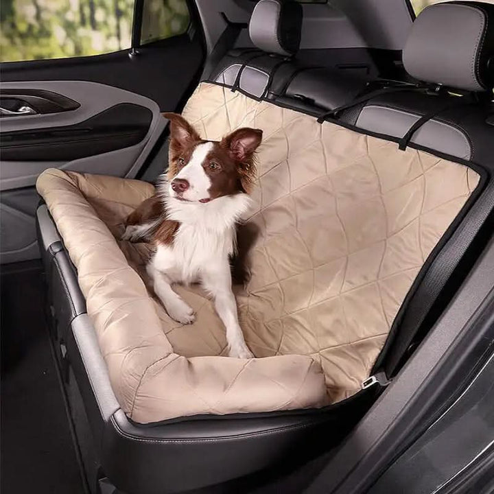 Waterproof quilted dog car seat cover for rear seats, featuring anti-slip base & easy clean design for pet travel.