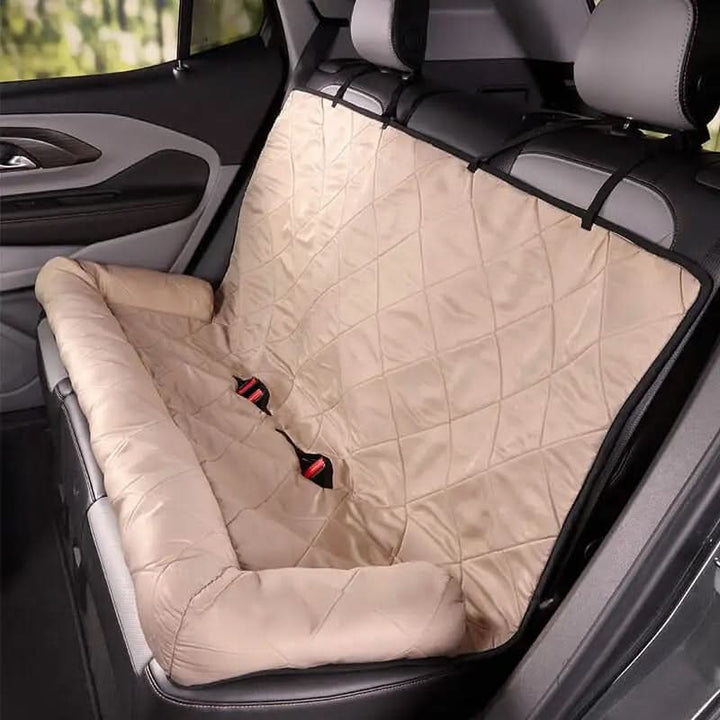 Durable quilted waterproof dog car seat protector. Anti-slip base ensures pet safety & vehicle protection during travel.
