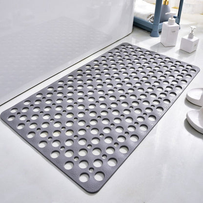 Flexible PVC bath mat with numerous suction cups on the underside for secure, anti-slip bathroom use