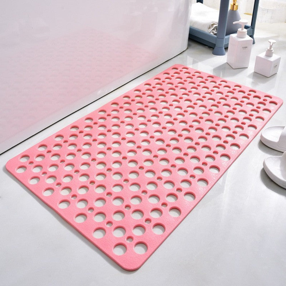 Detailed view of quick drain holes on an anti-slip shower mat, ensuring water runoff and safety