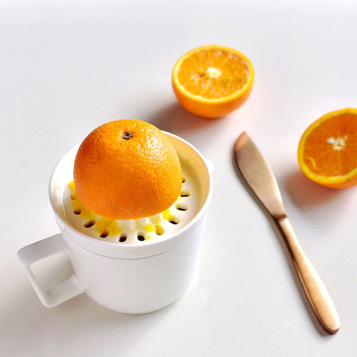 Elegant ceramic lemon squeezer, a stylish and practical kitchen tool for daily fresh juice.