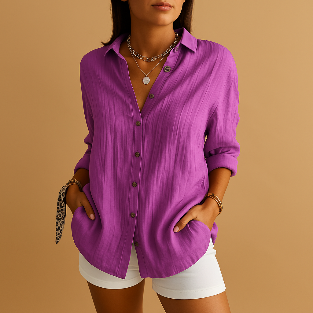 Back view of a women's airy cotton-linen long-sleeve blouse with a relaxed and comfortable fit, new.